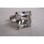 Silver ring set with large square stone