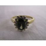 Gold stone set cluster ring