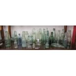 Shelf of old glass bottles
