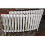 Pair of heavy cast iron curved radiators