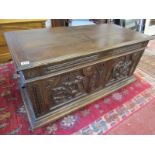 Carved oak antique coffer with candle box