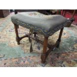 Antique upholstered stool