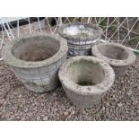 2 pairs of round stone planters