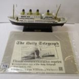 Model ship - Titanic & newspaper