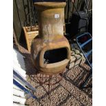 Terracotta chiminea on stand