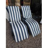 Pair of garden loungers with cushions