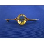 Gold stone set bar brooch