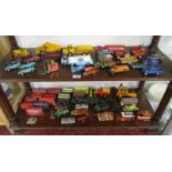 2 shelves of die-cast vehicles to include Corgi & Dinky
