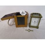 Small leather cased carriage clock