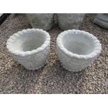 Pair of stone 'Acorn Pots' - circular planters featuring oak leaves and acorns
