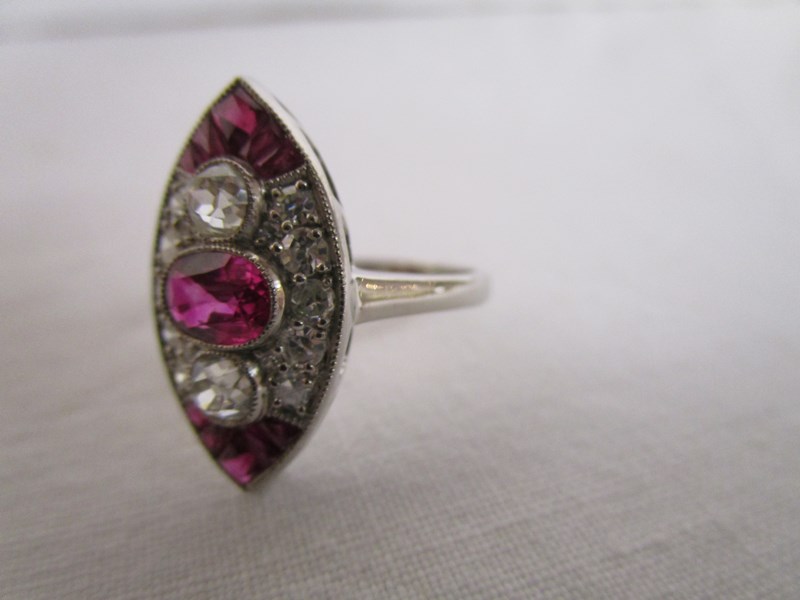 Fine platinum ruby & diamond set ring