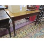 Mahogany table with reeded legs