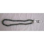 Black pearl necklace with 18ct & diamond clasp