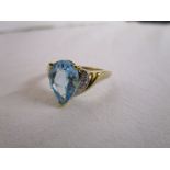 Gold blue topaz & diamond set ring