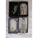 Costume brooches and bracelets
