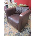 Brown leather armchair