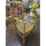 Small gilt bergère armchair