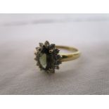 Gold stone set cluster ring