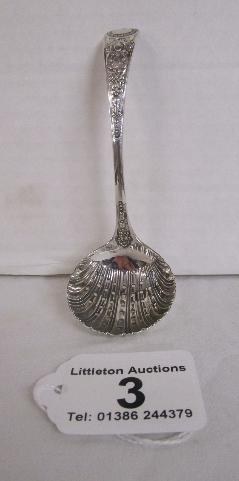 Silver sifting spoon