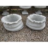 Pair of large stone sack planters