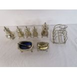 Collection of silver pepperettes, toast rack etc.