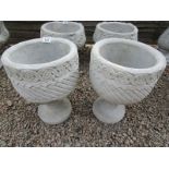 Pair of stone Mayan urns - Circular planters decorated with Aztec design on circular base