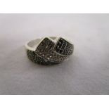 White gold, black and white diamond set ring