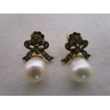 Pair of pearl and diamond drop earrings