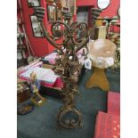 Unusual iron candelabra adorned with roses