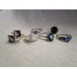 Six silver & stone set rings