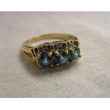 Gold blue topaz & diamond ring