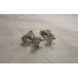 Pair of 18ct gold diamond stud earrings