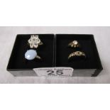 4 gold stone set rings