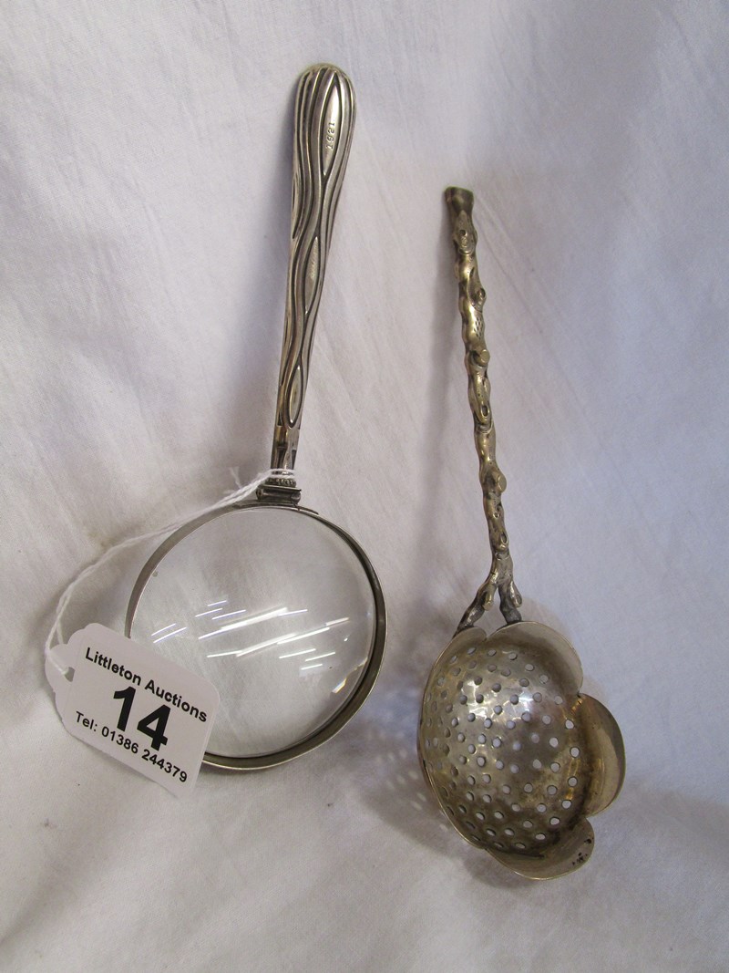 Silver magnifying glass & straining spoon