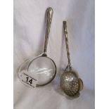 Silver magnifying glass & straining spoon