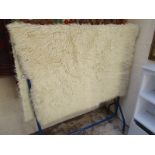 Large woollen shag pile rug