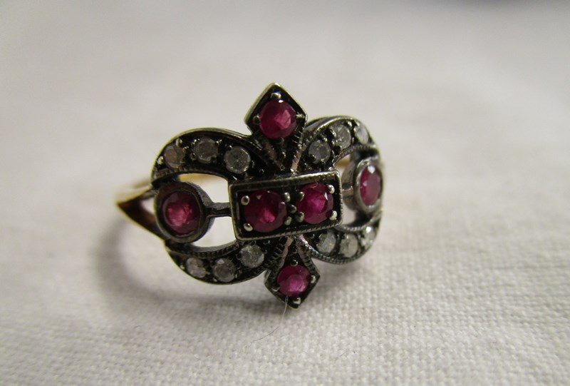 Gold ruby & diamond set ring