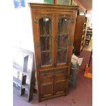 Old Charm oak corner cabinet with lights