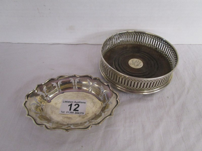 Pierced silver dish and silver mounted Champagne coaster