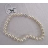 Pearl necklace with white gold clasp