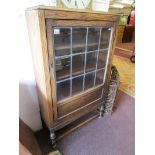 Oak and glazed book case