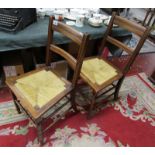 Pair of rush seated dinning chairs