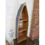 Boat shaped wall shelves