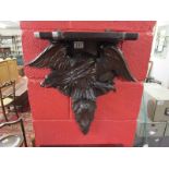 Carved eagle shelf