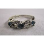 White gold blue topaz & diamond set ring