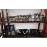 2 shelves of pewter and silver plate