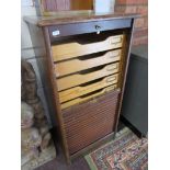 Oak tambour front filing cabinet with key