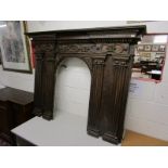 Decorative oak and pine Gothic style fire surround