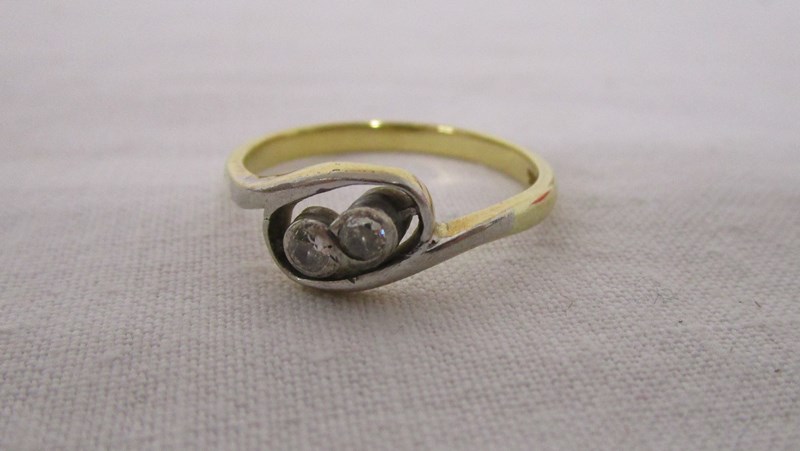 18ct gold diamond twist ring