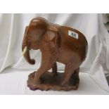 Carved wooden study of an elephant